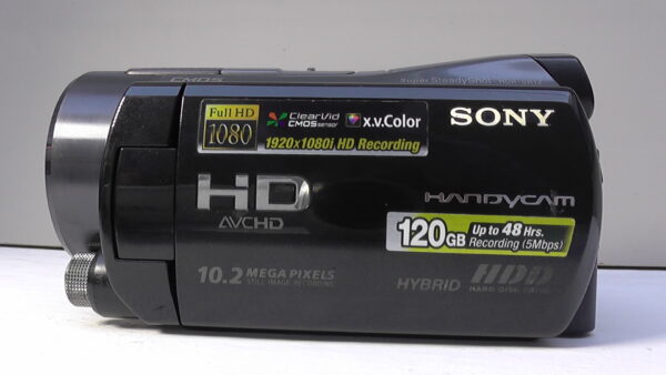 filmadora sony hdr-sr12 usada com anel pequeno multifuncional para controle rápido de ajustes manuais. - Imagem 2