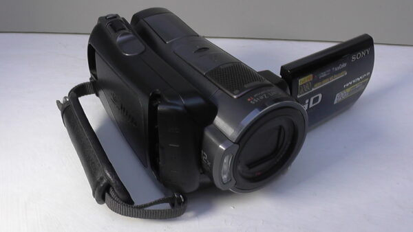 filmadora sony hdr-sr12 usada com anel pequeno multifuncional para controle rápido de ajustes manuais. - Imagem 4